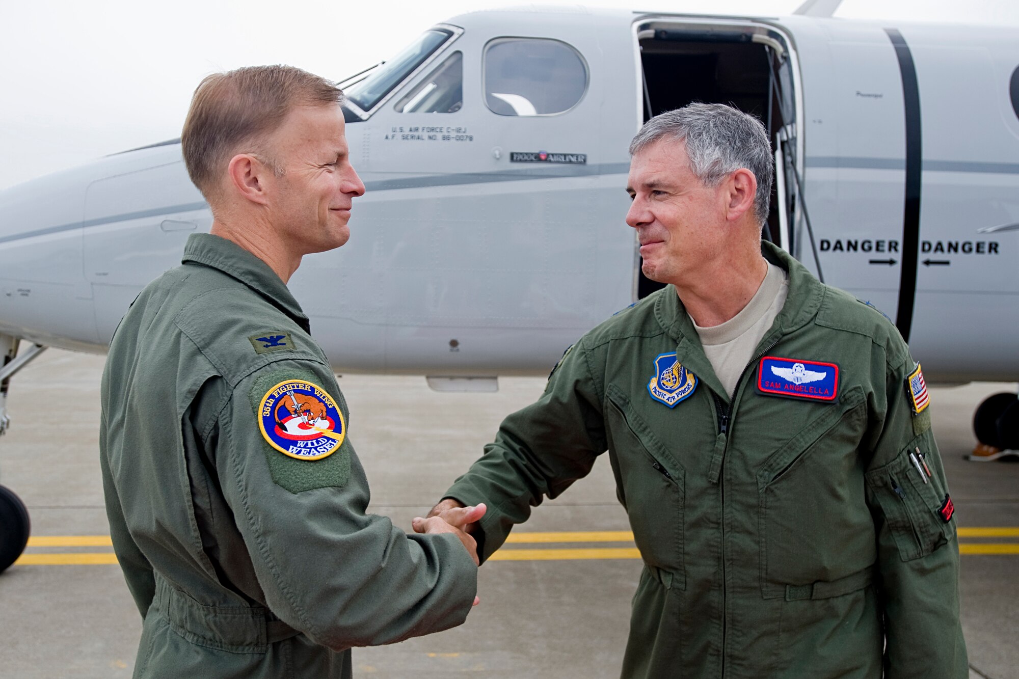 MISAWA AIR BASE, Japan -- Col. RC Craig, 35th Fighter Wing vice commander, greets Maj. Gen. Sam Angelella, 5th Air Force vice commander and 13th Air Force deputy commander, June 10 at the flightline. General Angelella, a former 35th FW commander in 2007, is visiting Misawa to meet with base leadership. (U.S. Air Force photo/Senior Airman Jamal D. Sutter)