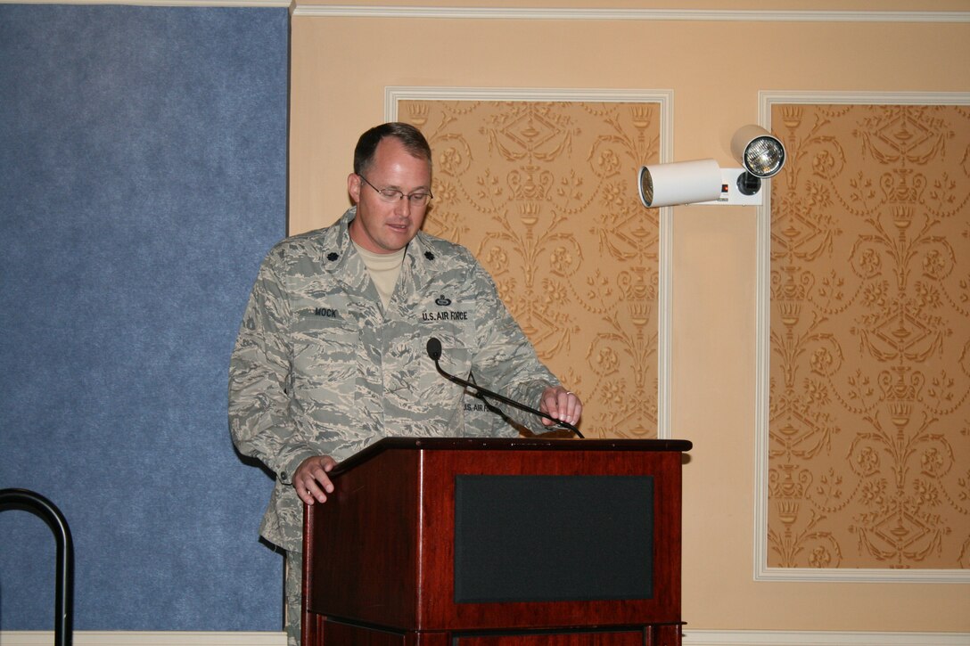 Lt. Col. James Mock, 30th Intelligence Squadron commander, addresses members of his squadron and guests at a change of command ceremony at Langley Air Force Base, Va., June 9. "Coming from the ISR division at the U.S. Central Command, I know first hand the daily impact the 30th Intelligence Squadron is making in the U.S. Central Command joint operating areas," said Colonel Mock. "It is an honor and privilege to be their commander." (U.S. Air Force photo by Technical Sgt. Joshua Ward)