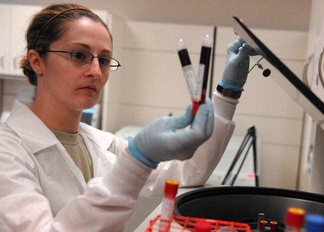 Senior Airman Jessica Campbell checks blood vials before inserting them into the centrifuge for separation at the 628th Medical Group laboratory June 8, 2010 on Joint Base Charleston, S.C. The centrifuge spins at high rounds per minute separating the red and white blood cells from the serum for testing. Airman Campbell is a lab technician with the 628 MDG. (U.S. Air Force photo/Senior Airman Timothy Taylor)
