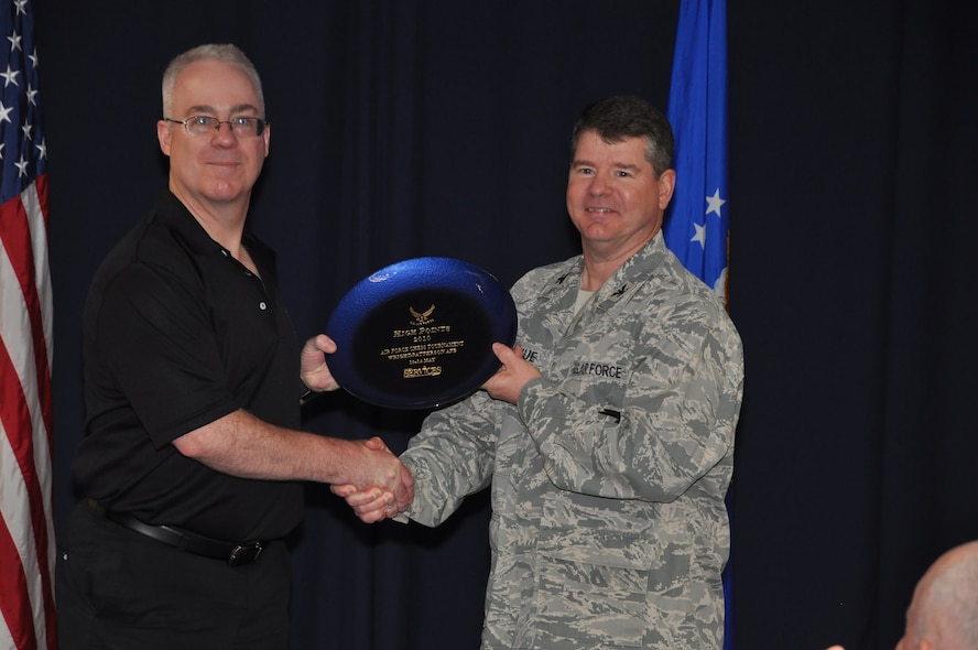 WRIGHT-PATTERSON AIR FORCE BASE, Ohio -- Lt. Col. Douglas Taffinder poses for a photo with Col. Tim Donohue, 88th Mission Support Group commander, after winning the 2010 Air Force Chess Tournament here May 15. The lieutenant colonel, assigned to U.S. Strategic Command Headquarters at Offutt AFB, Neb., will now represent the Air Force during the 2010 Inter-service Championships set for Aug. 2 - 6 at Naval Station Great Lakes, Ill. U.S. Air Force photo by Ryan P. Burger