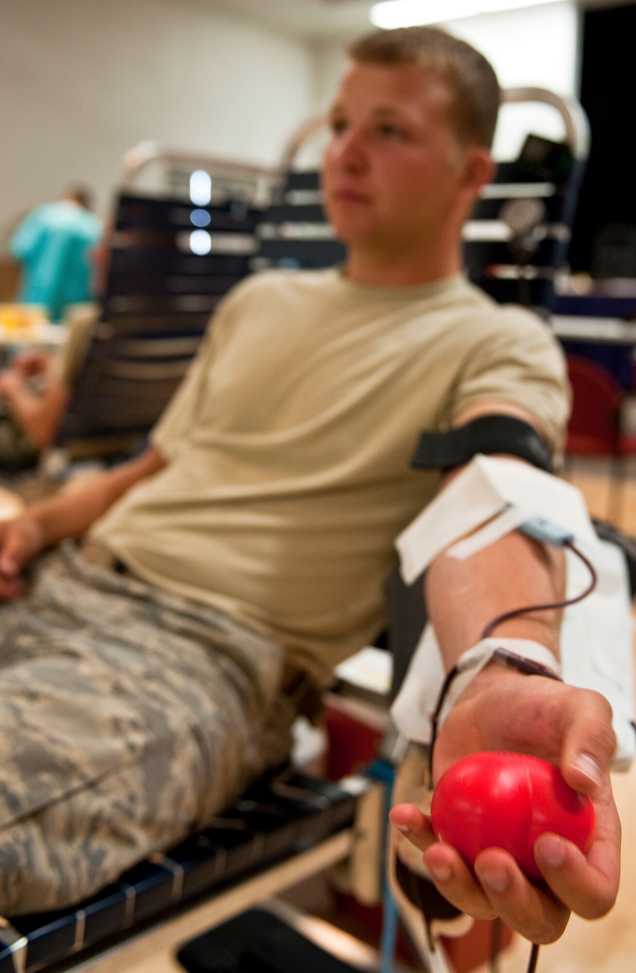 HOLLOMAN AIR FORCE BASE, N.M. -- Airman 1st Class Jacob Shoff, 49th Civil Engineer Squadron, donates blood at the Armed Forces Blood Drive June 7, 2010. Airman Shoff has donated blood eight times, but the latest donation is his first at Holloman. Blood donation is a common practice and promoted to the civilian and military populations through programs sponsored by the American Red Cross and Armed Services Blood Program. (U.S. Air Force photo by Senior Airman DeAndre Curtiss / Released)