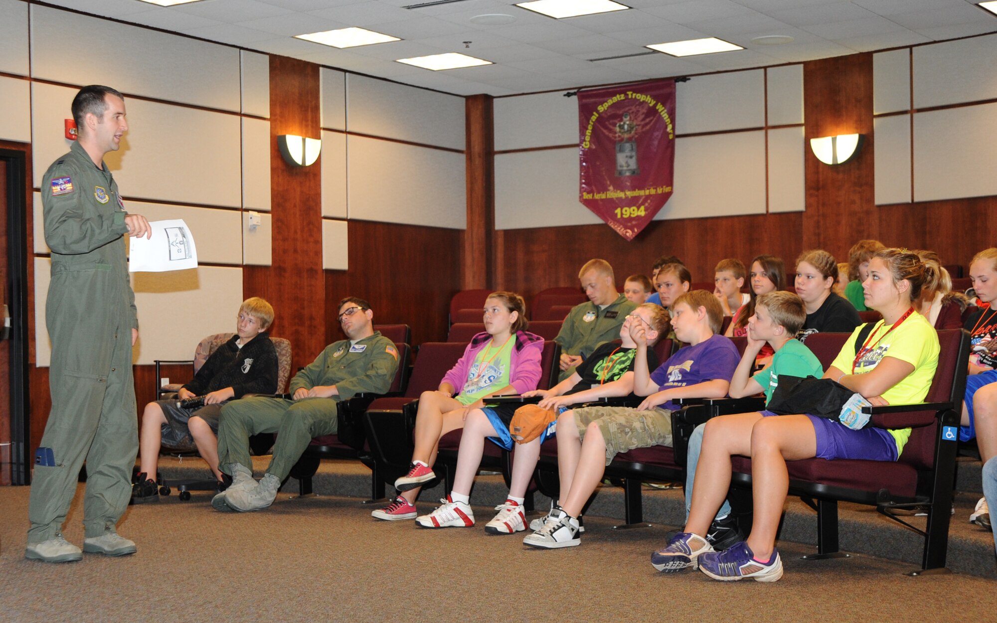 U.S. Air Force Academy Capt. Nick Williams, 384th Air Refueling Squadron command executive officer, speaks to students from Douglas Middle School and cadets from the Air Force Academy, about McConnell’s active-duty, Guard and Reserve mission capabilities June 8, 2010, McConnell Air Force Base, Kan.  The cadets toured McConnell to learn and observe the different career field options available when they become commissioned as officers.  There are nine cadets from the academy here at McConnell, they arrived June 1 and will be here until June 17. (U.S. Air Force photo/Airman 1st Class Andrea Salazar)
