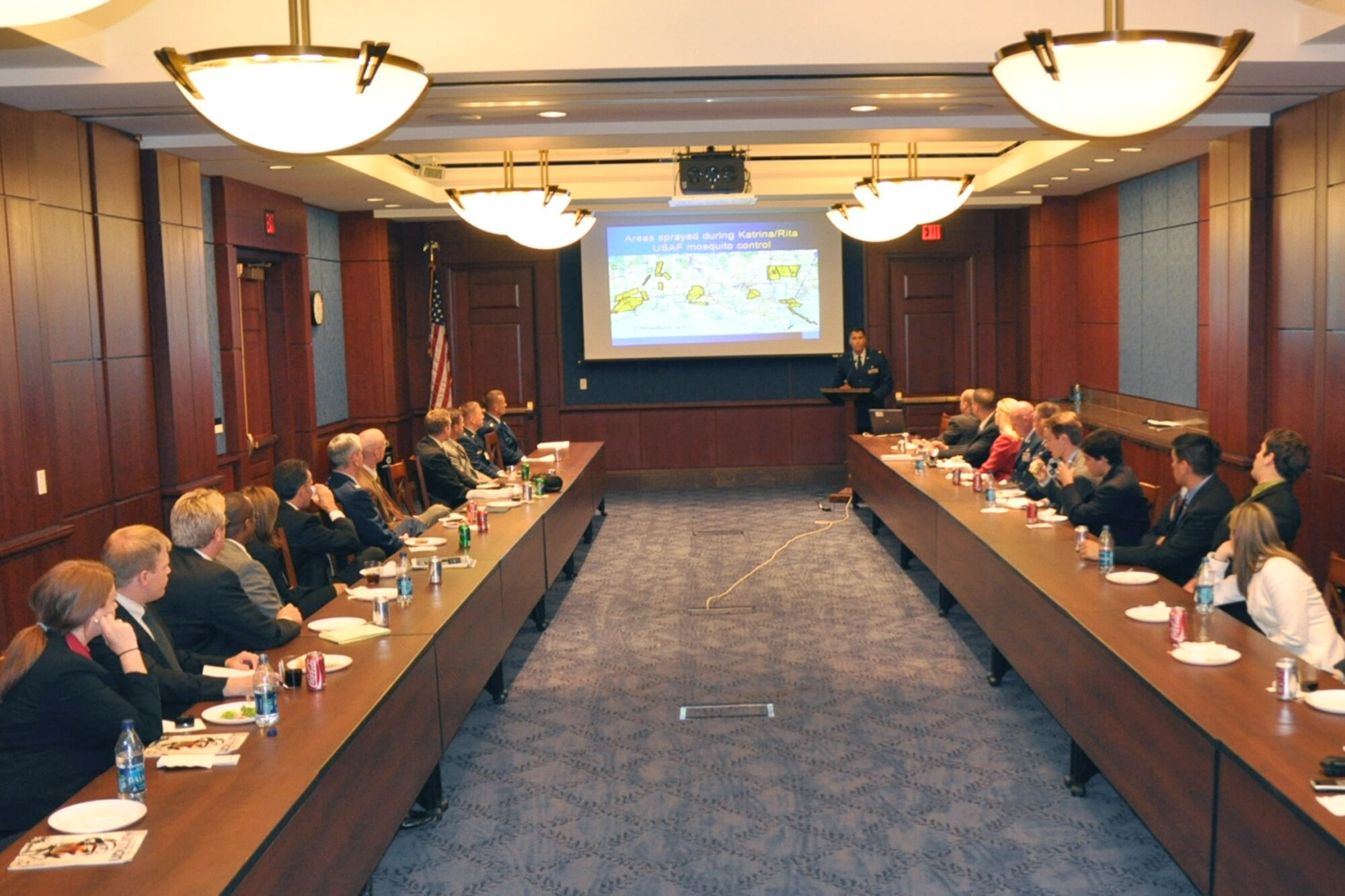 Maj. Mark Breidenbaugh speaks to a group of congressional staffers June 8, 2010, in Washington. Major Breidenbaugh and a small team of reservists from the 910th Airlift Wing spoke to the group about the unit's aerial spray mission and the wing's recent operations in the Gulf of Mexico. Major Breidenbaugh is an entomologist assigned to the 910th Airlift Wing, based at Youngstown Air Reserve Station, Ohio. (U.S. Air Force photo/Master Sgt. Bob Barko Jr.)
