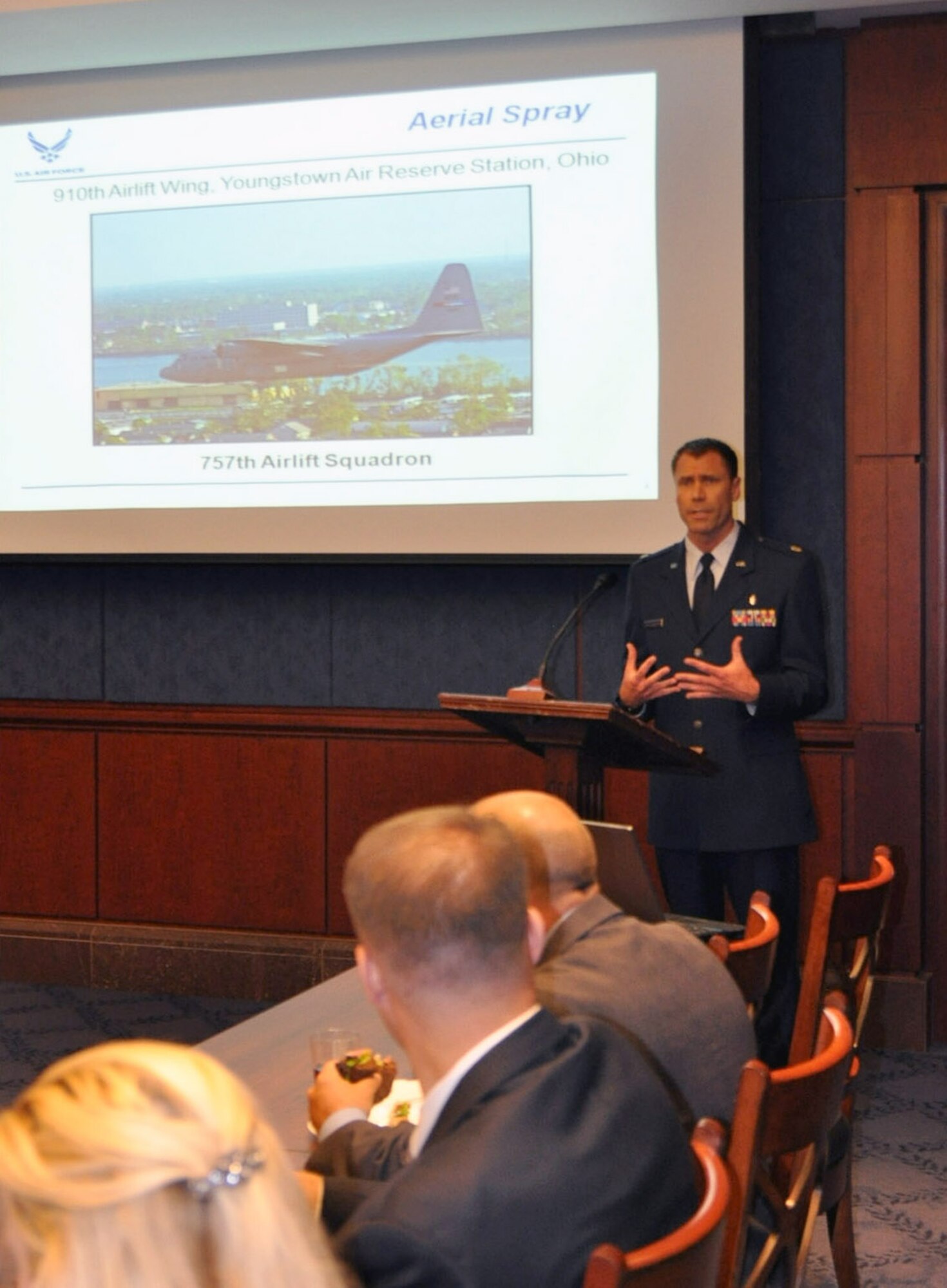 Maj. Mark Breidenbaugh speaks to a group of congressional staffers June 8, 2010, in Washington. Major Breidenbaugh and a small team of reservists from the 910th Airlift Wing spoke to the group about the unit's aerial spray mission and the wing's recent operations in the Gulf of Mexico. Major Breidenbaugh is an entomologist assigned to the 910th Airlift Wing, based at Youngstown Air Reserve Station, Ohio. (U.S. Air Force photo/Master Sgt. Bob Barko Jr.)