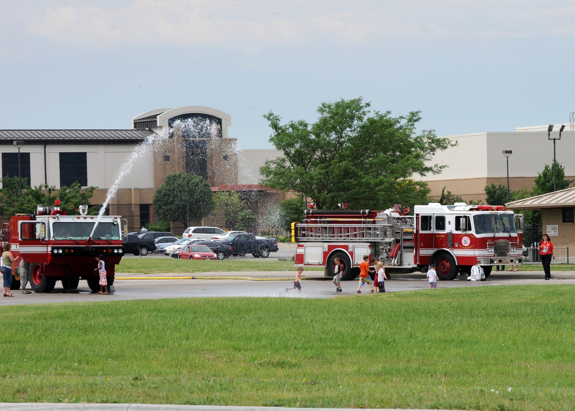 McConnell’s Fire Department helps kick off the base library’s Summer Reading Program by allowing children to tour their fire trucks June 7, 2010, McConnell Air Force Base, Kan.  This summer’s theme is “Splash Down” and encourages children to read and cool-off during the summer months.  Team McConnell members can contact the base library to register their children for the months of June through July. (U.S. Air Force photo/Airman 1st Class Andrea Salazar)
