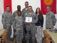 SrA. Horning with the 174th Fighter Wing, Security Forces Squadron is awarded the Diamond Sharp award at Manas AB, Kyrgyzstan.
