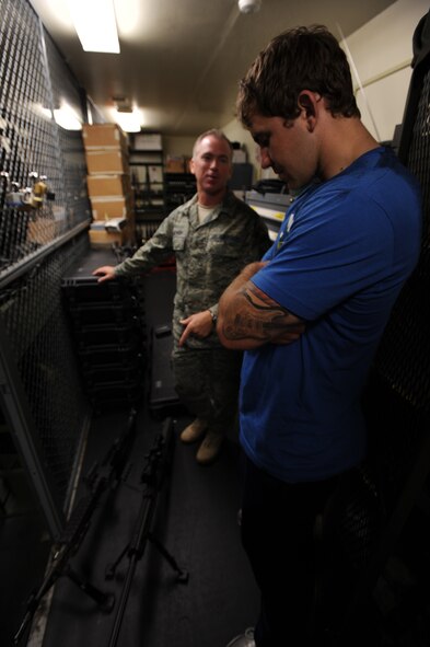 Ultimate Fighting Championship middleweight fighter, Alan "The Talent" Belcher, gets a tour of the armory at the 23rd Special Tactics and Training Squadron here June 8th, 2010.  Mr. Belcher taught a combatives class for Special Tactics and Training Squadron combat controllers going through training here. (U.S. Air Force photo by Senior Airman Matthew Loken) 
