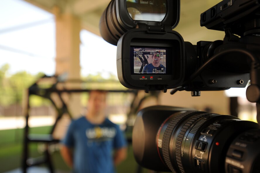 Ultimate Fighting Championship middleweight fighter, Alan "The Talent" Belcher, gets interviewed by base broadcasters.  Mr. Belcher taught a combatives class for Special Tactics and Training Squadron combat controllers going through training here, June 8th. (U.S. Air Force photo by Senior Airman Matthew Loken) 