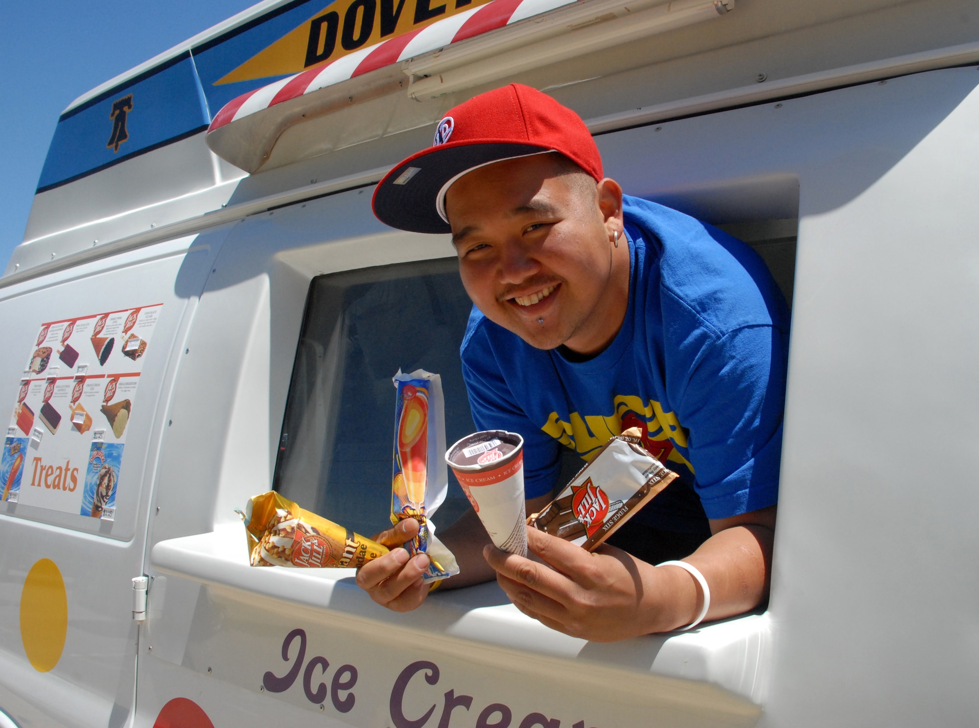 Edison Malaga, 436th Force Support Squadron Eagle Lanes Bowling Center Ice Cream Man, is riding the ice cream truck around base and housing all summer long selling a variety of 11 flavors of frozen desserts. (U.S Air Force photo/ Airman 1st Class Shen-Chia Chu)