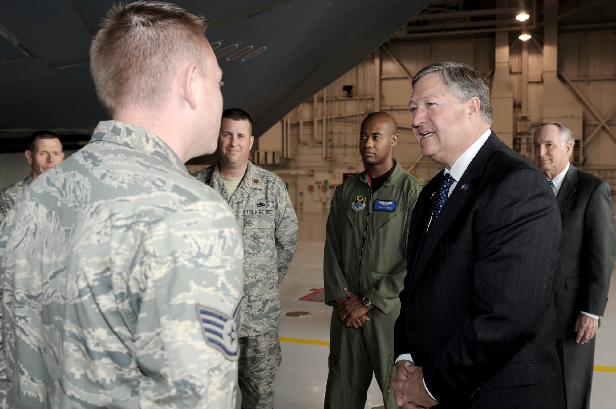 Staff Sgt. Jacob Westad briefs Secretary of the Air Force Michael Donley on hangar B-2 Spirit operations June 8, 2010, at Whiteman Air Force Base, Mo. Sergeant Westad is a 509th Aircraft Maintenance Squadron dedicated crew chief. (U.S. Air Force photo/Airman 1st Class Carlin Leslie)
