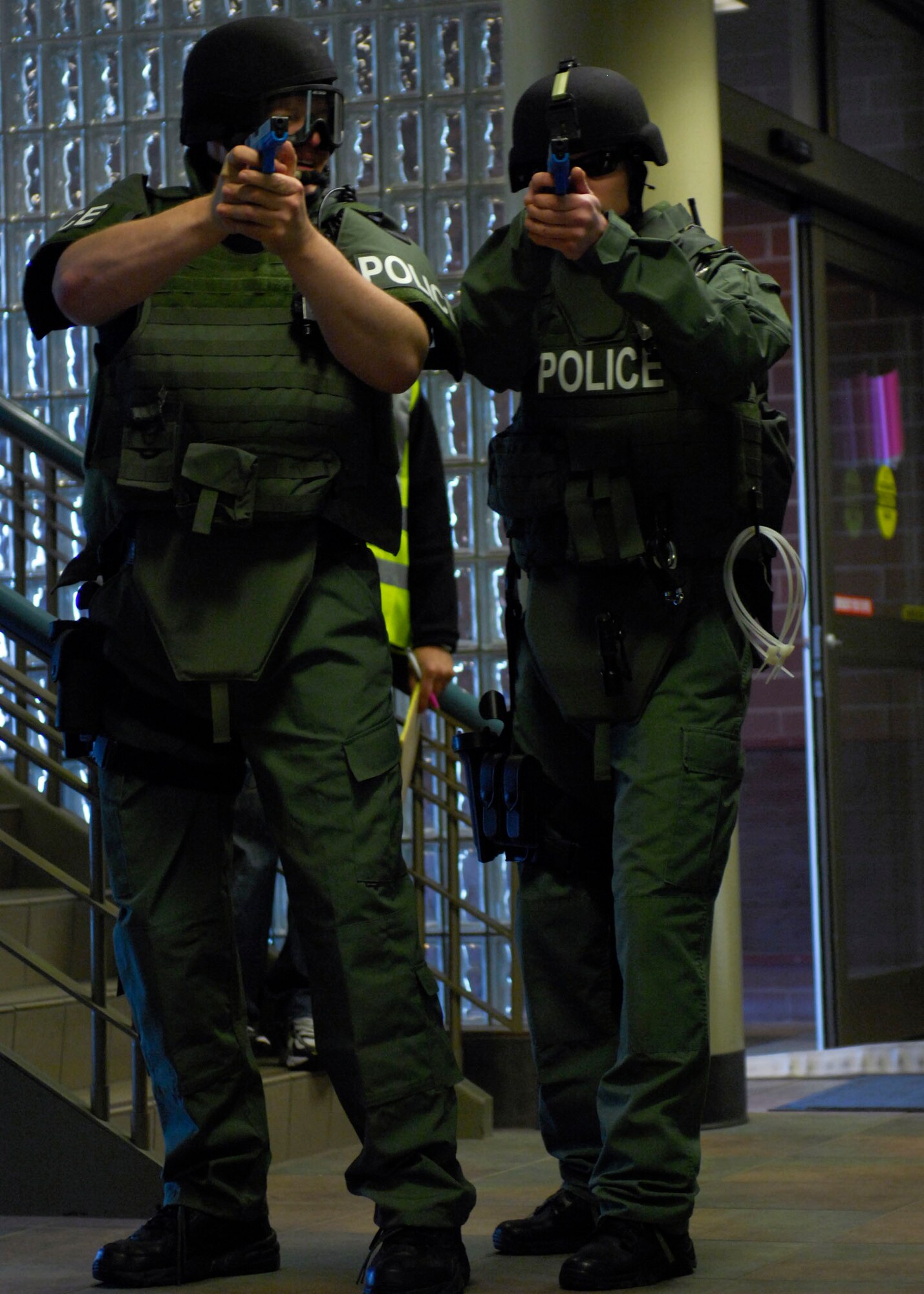 MINOT, N.D. -- Members from the Minot Police Department Special Weapons and Tactics team search for a “terrorist” at the Minot International Airport here June 4. Minot AFB members helped support the Minot Police Department in the area’s Major Accident Response Exercise, also known as MARE. (U.S. Air Force photo by Senior Airman Ashley N. Avecilla)