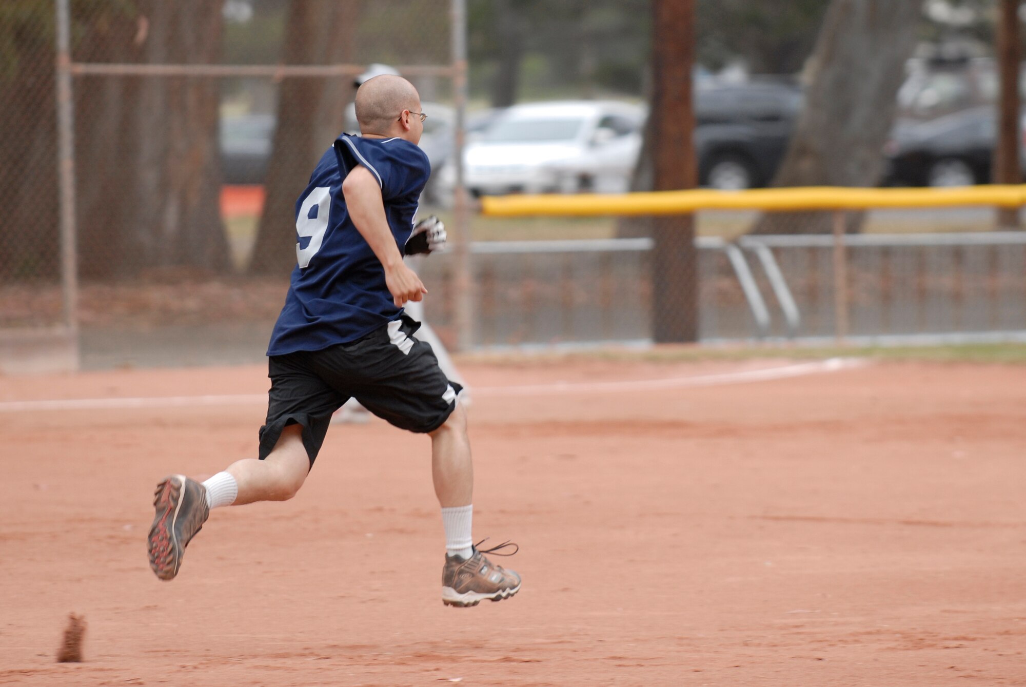 VANDENBERG AIR FORCE BASE, Calif. --  Elvis Gonzales, a 533rd Training Squadron team member, sprints to second base during an intramural softball game at the base field here Monday, June 7, 2010.  The 533rd TRS played the 381st Training Support Squadron team.  (U.S. Air Force photo/Senior Airman Andrew Satran) 

 
 
 

 
 