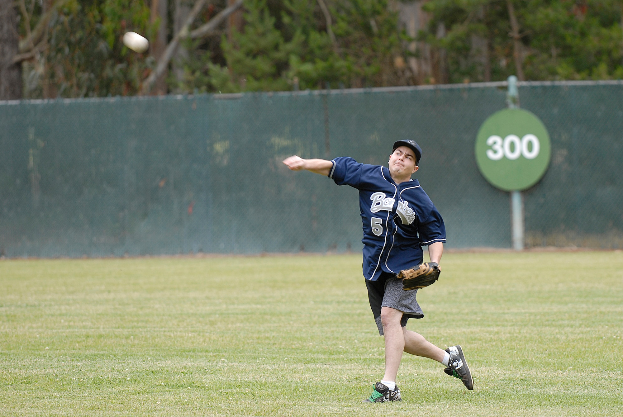 VANDENBERG AIR FORCE BASE, Calif. --  Hurling a softball to his team members, Carl Billardo, a 533rd Training Squadron team member, throws to the second baseman during an intramural game at the base field here Monday, June 7, 2010.  The 533rd TRS played competitively in both offense and defense.  (U.S. Air Force photo/Senior Airman Andrew Satran) 

 
 
 

 
 