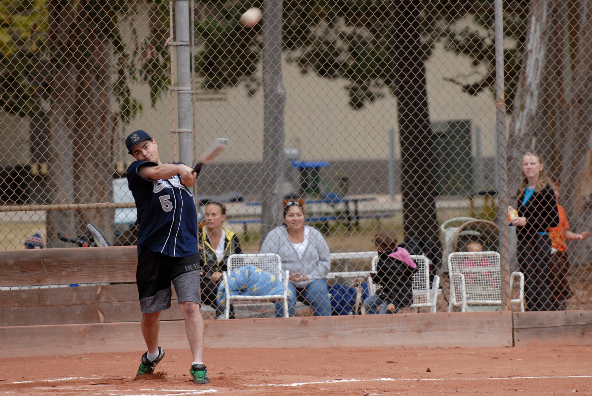 VANDENBERG AIR FORCE BASE, Calif. --  Sending the ball into the outfield, Carl Billardo, a 533rd Training Squadron team member, smacks the softball during an intramural game at the base field here Monday, June 7, 2010.  The 533rd TRS played competitively in both offense and defense.  (U.S. Air Force photo/Senior Airman Andrew Satran) 

 
 

 
 