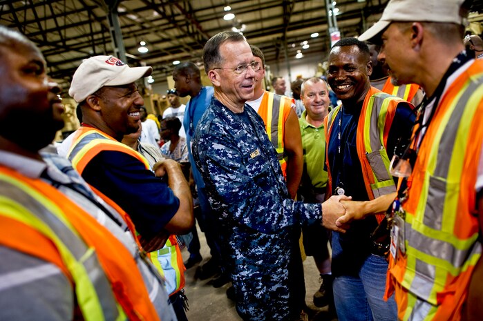 Navy Adm. Mike Mullen, chairman of the Joint Chiefs of Staff, thanks workers of the mine-resistant, ambush-protected all-terrain vehicle workforce at Naval Weapons Station Charleston, S.C., June 3, 2010. Admiral Mullen addressed the workforce and congratulated them on reaching their 25,000 vehicle integration and 5,000 M-ATV integration milestones. (DoD photo/Mass Communication Specialist Chad J. McNeeley)