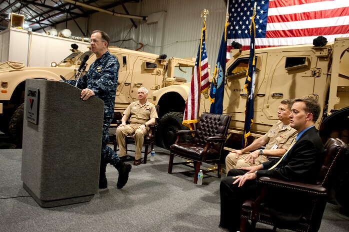 Navy Adm. Mike Mullen, chairman of the Joint Chiefs of Staff, addresses audience members at a ceremony celebrating the completion of 25,000 electronic systems vehicle integrations at Naval Weapons Station Charleston, S.C., June 3, 2010. (DoD photo/Mass Communication Specialist Chad J. McNeeley)