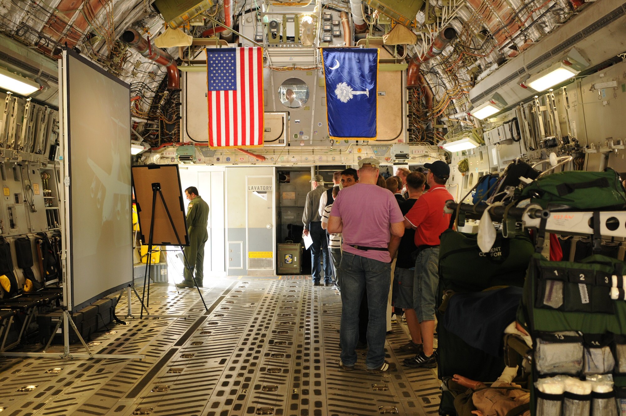 BERLIN -- Visitors line up inside a C-17 Globemaster III during the ILA 2010 Berlin International Aerospace Exhibition and Conferences Air Show June 8 at Berlin-Schoenefeld Airport. The aircraft is with the 16th Airlift Squadron from Charleston Air Force Base, S.C. (U.S. Air Force photo/Staff Sgt. Julius Delos Reyes)