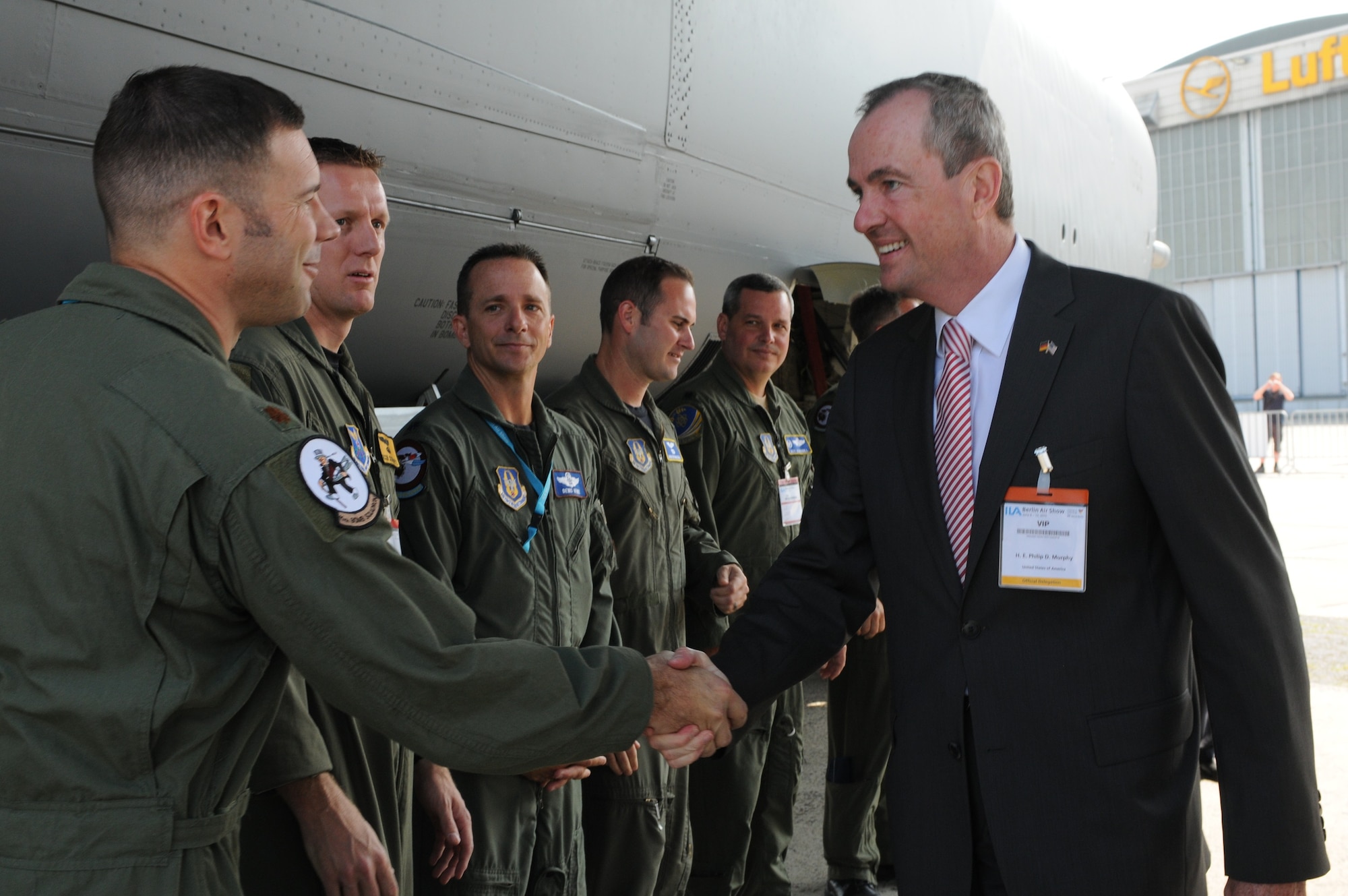 BERLIN -- Philip Murphy, U.S. Ambassador to the Federal Republic of Germany, meets Air Force aircrew during the unveiling of the ILA 2010 Berlin International Aerospace Exhibition and Conferences Air Show June 8 at Berlin-Schoenefeld Airport. Approximately 90 U.S. military aircrew and support personnel from bases in Europe and continental U.S. are participating in the Berlin Air Show, one of the premier events of its type in the world. In addition, aircraft displays, such as B-1B Lancer, C-130J Hercules, C-17 Globemaster III, C-5 Galaxy, KC-135 Stratotanker and B-52 Stratofortress, are featured for public viewing. (U.S. Air Force photo/Staff Sgt. Julius Delos Reyes)