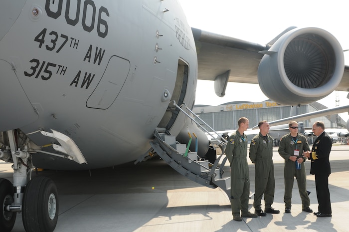 BERLIN -- Vice Adm. Jeffrey Wieringa, Defense Security Cooperation Agency director, meets with Air Force aircrew during the ILA 2010 Berlin International Aerospace Exhibition and Conferences Air Show kickoff June 8 at Berlin-Schoenefeld Airport. The Berlin Air Show is one of the premier events of its type in the world. (U.S. Air Force photo/Staff Sgt. Julius Delos Reyes)