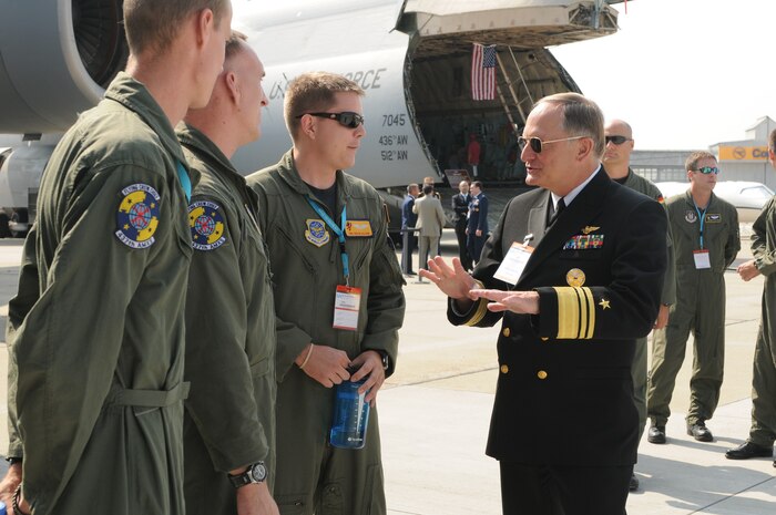BERLIN -- Vice Adm. Jeffrey Wieringa, Defense Security Cooperation Agency director, meets with Air Force aircrew during the ILA 2010 Berlin International Aerospace Exhibition and Conferences Air Show kickoff June 8 at Berlin-Schoenefeld Airport. The Berlin Air Show is one of the premier events of its type in the world. (U.S. Air Force photo/Staff Sgt. Julius Delos Reyes)