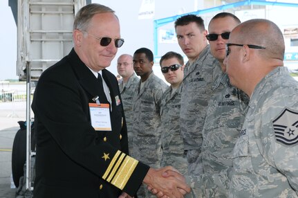 BERLIN -- Vice Adm. Jeffrey Wieringa, Defense Security Cooperation Agency director, meets with Air Force aircrew during the ILA 2010 Berlin International Aerospace Exhibition and Conferences Air Show kickoff June 8 at Berlin-Schoenefeld Airport. The Berlin Air Show is one of the premier events of its type in the world. (U.S. Air Force photo/Staff Sgt. Julius Delos Reyes)