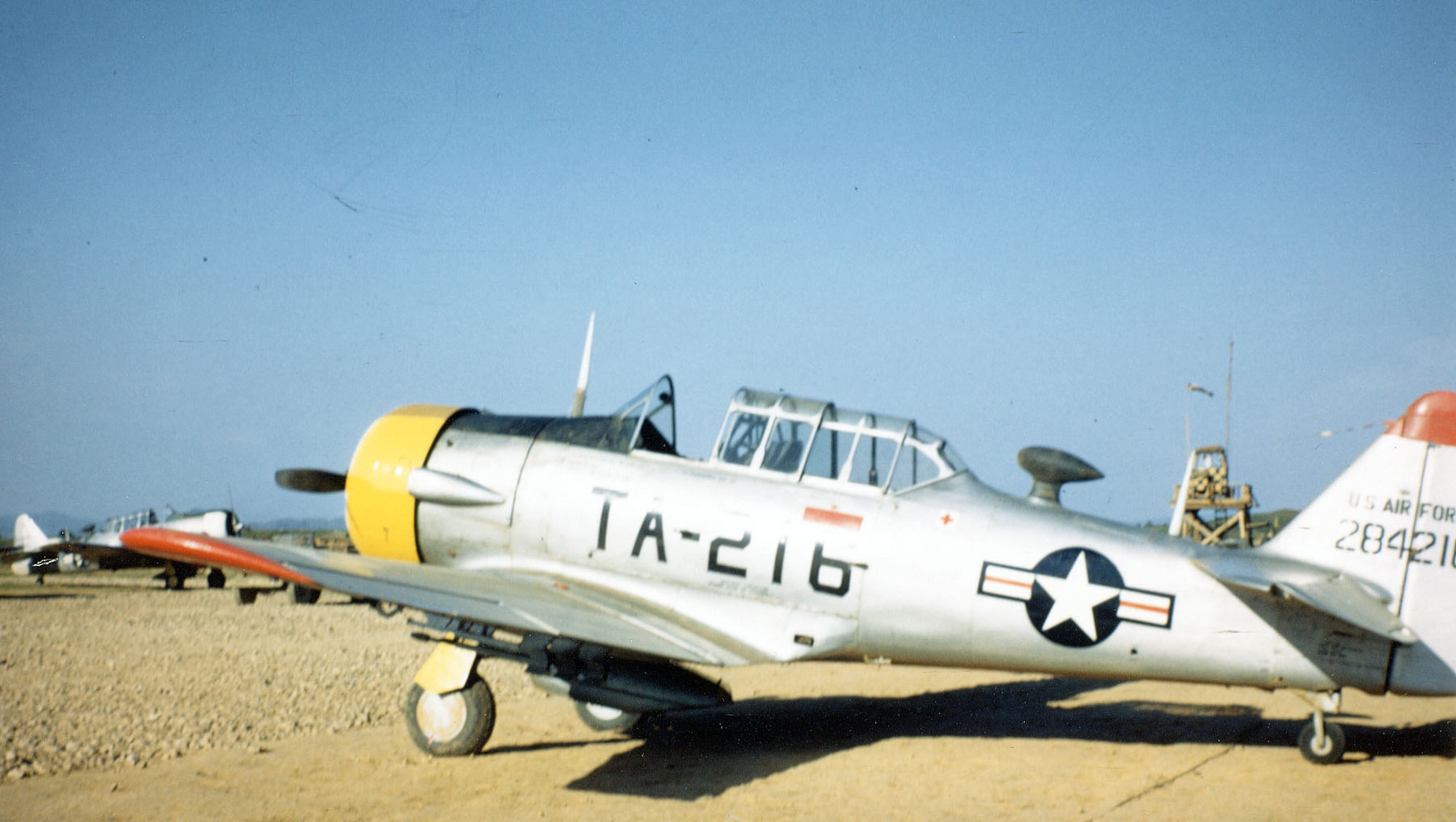 The museum's T-6D at an airfield in Korea in the summer of 1951. (U.S. Air Force photo)