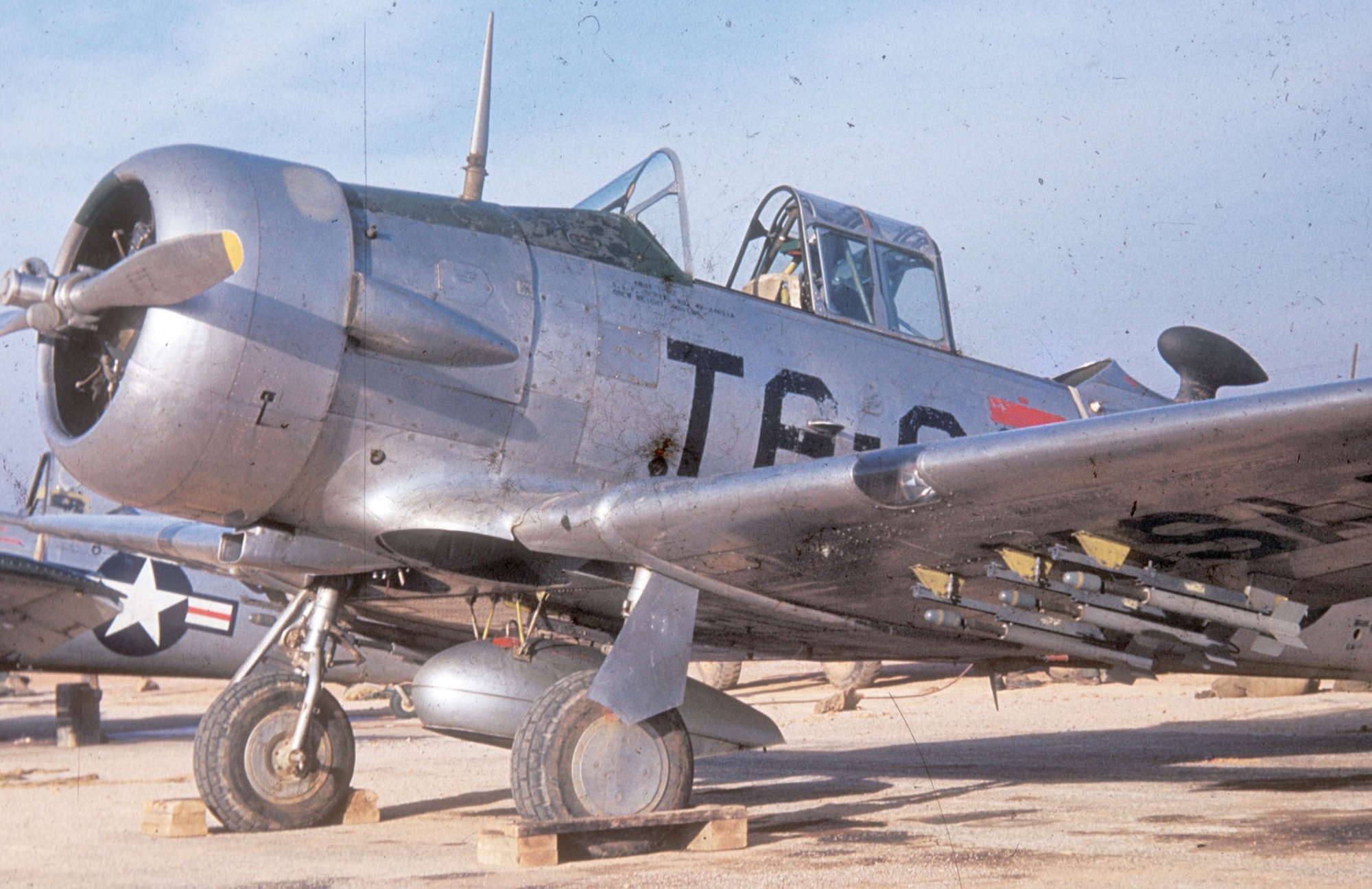 USAF personnel developed a clever way to visually mark targets. They fabricated rocket rails to attach custom-made rockets -- these rockets were made from a 2.36-inch white phosphorus bazooka warhead attached to the front of a 2.25-inch aircraft practice rocket. (U.S. Air Force photo)