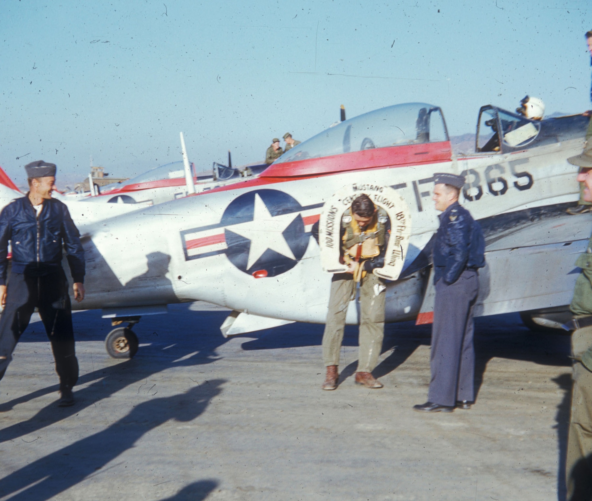 This 18th Fighter-Bomber Wing F-51D pilot is celebrating after finishing his 100th mission. A typical tour for aircrew in Korea was 100 combat missions. (U.S. Air Force photo)