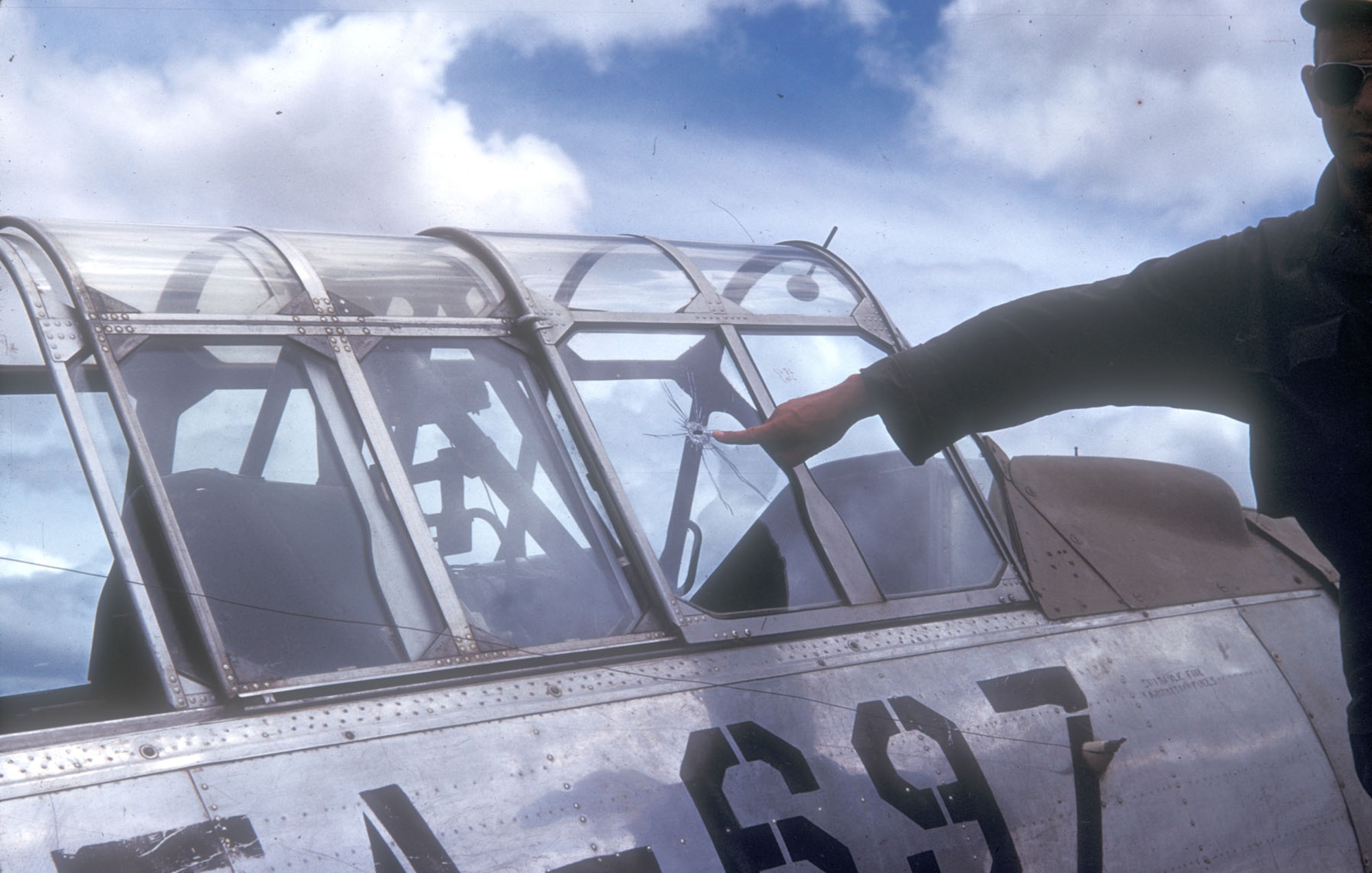 A single rifle bullet killed the pilot of this Mosquito T-6 in July 1951, forcing the backseat crewman to land it. Sixty-six Mosquito personnel died in combat or were missing in action.Thirty-one became POWs, of which 12 did not survive. About one-third of these casualties were from Tactical Air Control Parties. (U.S. Air Force photo)