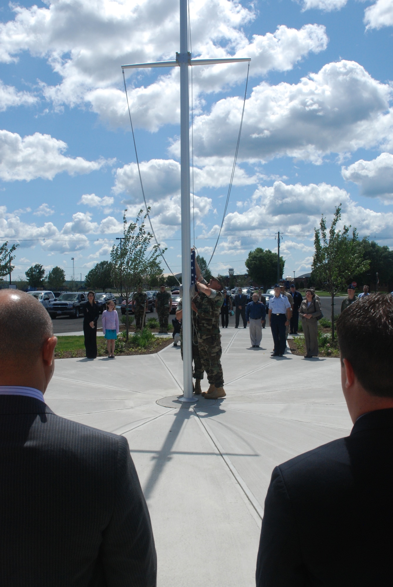 The U.S. flag was raised over the Naval Mobile Construction Battalion (NMCB) 27 building for the first time June 7. 
Fourteen active duty and about 550 reserve members of the NMCB 27 have relocated from Brunswick Naval Air Station, Maine, which is scheduled to close in 2011.  
