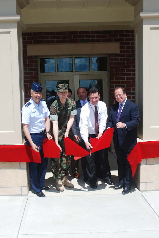 Military and local officials cut the ribbon June 7 for a 24,000?square foot building that will house a Navy Reserve Seabees unit at Westover.
Fourteen active duty and about 550 reserve members of the Naval Mobile Construction Battalion (NMCB) 27 have relocated from Brunswick Naval Air Station, Maine, which is scheduled to close in 2011.
