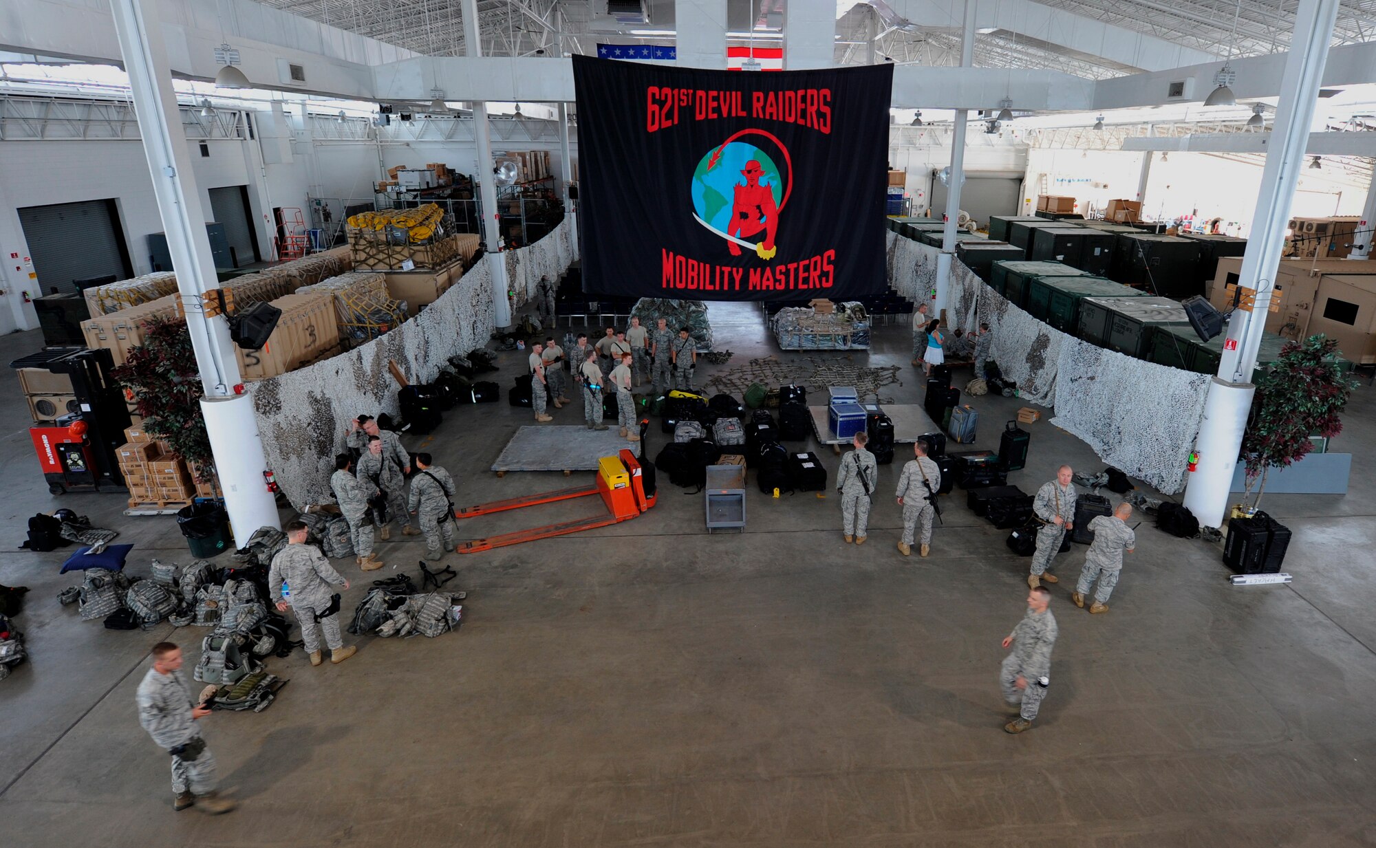 JOINT BASE MCGUIRE-DIX-LAKEHURST, N.J. -- Airmen assigned to the 621st Contingency Response Wing prepare to deploy to northern Afghanistan in support of the logistic surge for Operation Enduring Freedom at the 621 CRW’s Global Reach Deployment Center here. The unit specializes in providing short notice worldwide air mobility ground support in remote or austere locations.  (U.S. Air Force photo/Tech. Sgt. Parker Gyokeres/released)