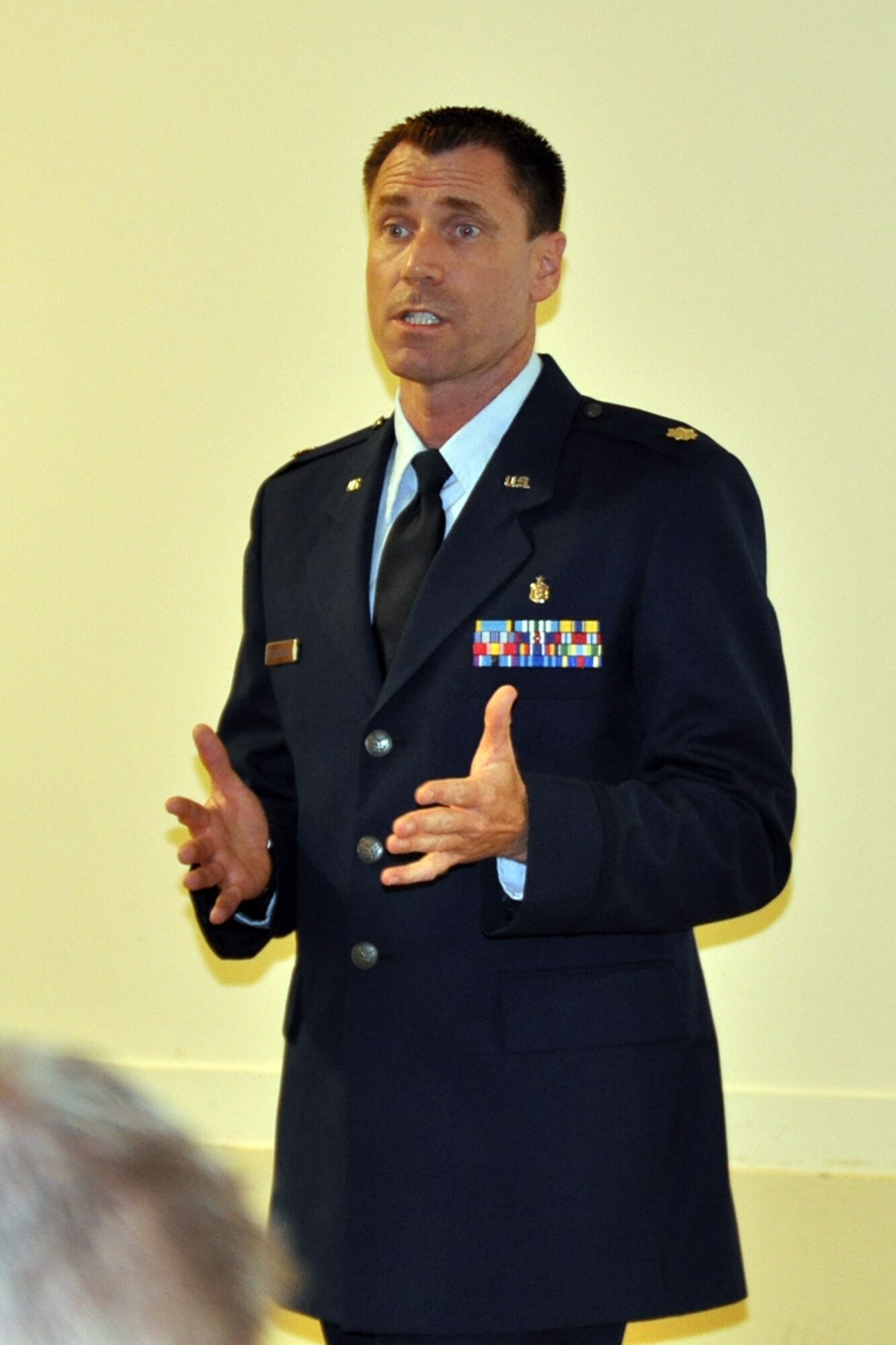 WASHINGTON DC -- Air Force Reserve Maj. Mark Briedenbaugh, an entomologist assigned to the 910th Airlift Wing, based at Youngstown Air Reserve Station, Ohio, speaks to a group of Congressional staffers here, June 7. Major Briedenbaugh and a small team of Citizen Airmen from the 910th spoke to the group about the unit's aerial spray mission and the wing's recent operations in the Gulf of Mexico. The airlift wing's 757th Airlift Squadron is home to the Department of Defense's only large area, fixed wing aerial spray squadron. The 757th was part of the ongoing multi-agency effort to combat the massive oil spill resulting from the April 20th sinking of the Deepwater Horizon drilling platform. The airlift squadron completed their work as part of the initial repsonse force for the oil spill as civilian aerial spray assets became available to continue the oil dispersing mission. (U.S. Air Force photo/Master Sgt. Bob Barko Jr.)