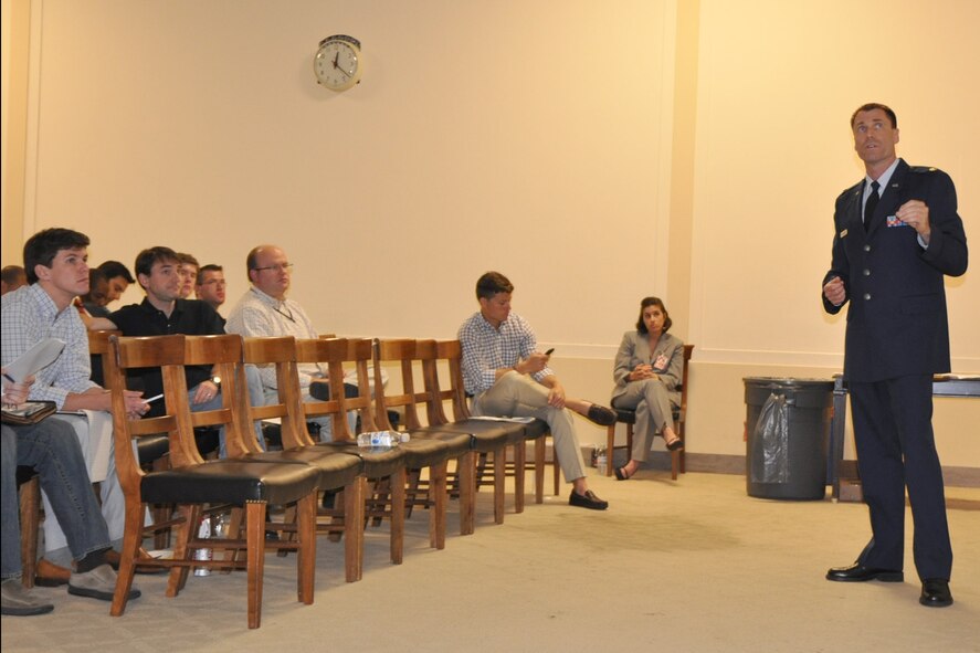 WASHINGTON DC -- Air Force Reserve Maj. Mark Briedenbaugh, an entomologist assigned to the 910th Airlift Wing, based at Youngstown Air Reserve Station, Ohio, speaks to a group of Congressional staffers here, June 7. Major Briedenbaugh and a small team of Citizen Airmen from the 910th spoke to the group about the unit's aerial spray mission and the wing's recent operations in the Gulf of Mexico. The airlift wing's 757th Airlift Squadron is home to the Department of Defense's only large area, fixed wing aerial spray squadron. The 757th was part of the ongoing multi-agency effort to combat the massive oil spill resulting from the April 20th sinking of the Deepwater Horizon drilling platform. The airlift squadron completed their work as part of the initial repsonse force for the oil spill as civilian aerial spray assets became available to continue the oil dispersing mission. (U.S. Air Force photo/Master Sgt. Bob Barko Jr)