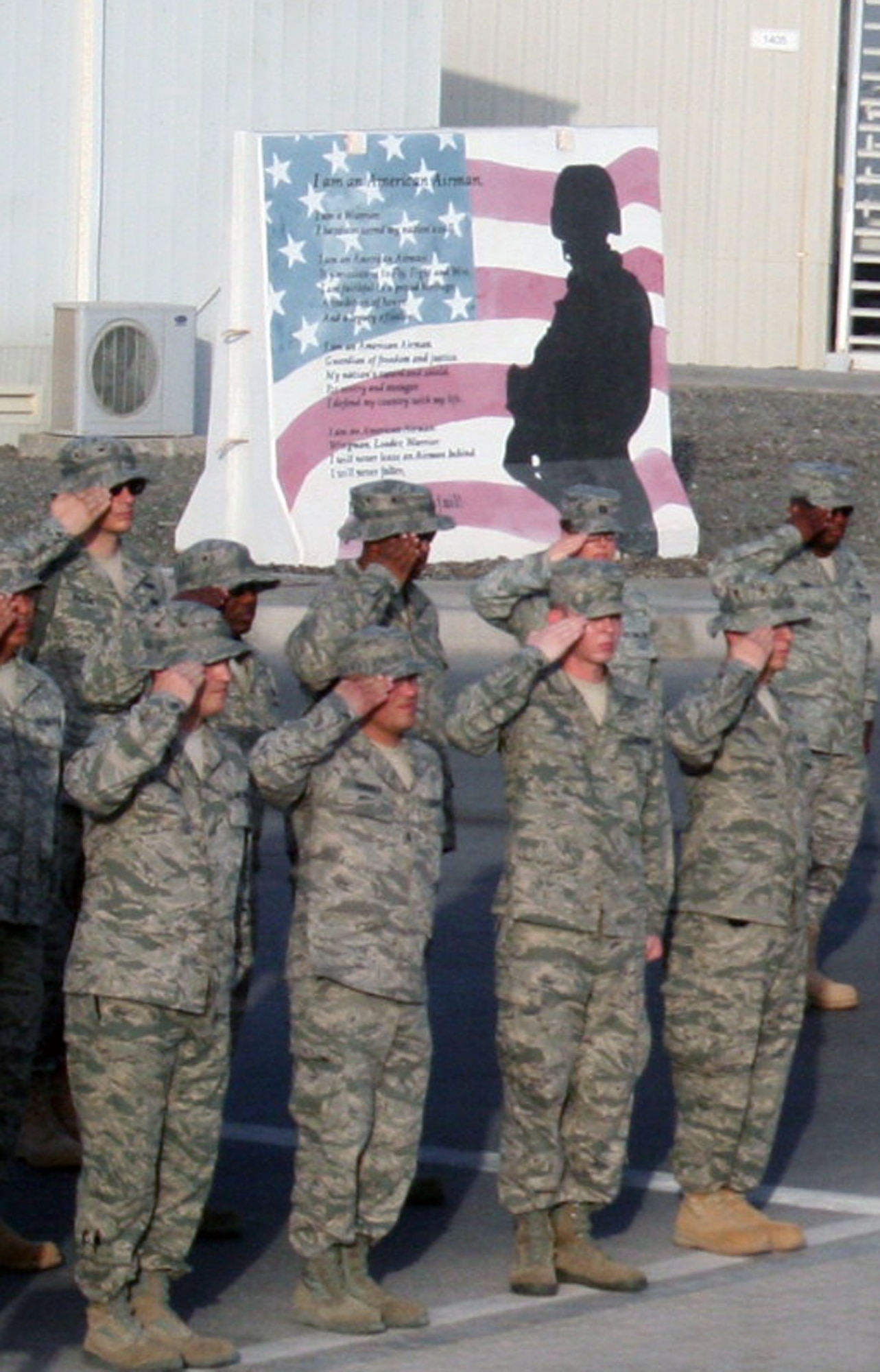 Airmen from the 380th Air Expeditionary Wing participate in a wing retreat ceremony on May 28, 2010, at a non-disclosed base in Southwest Asia. Every week the 380th AEW holds a retreat ceremony honoring the American flag as part of a continuing military tradition. On May 28, the 380th Expeditionary Medical Group served as the lead unit for the retreat. The 380th AEW supports operations Iraqi Freedom and Enduring Freedom and the Combined Joint Task Force-Horn of Africa. (U.S. Air Force Photo/Master Sgt. Scott T. Sturkol/Released)