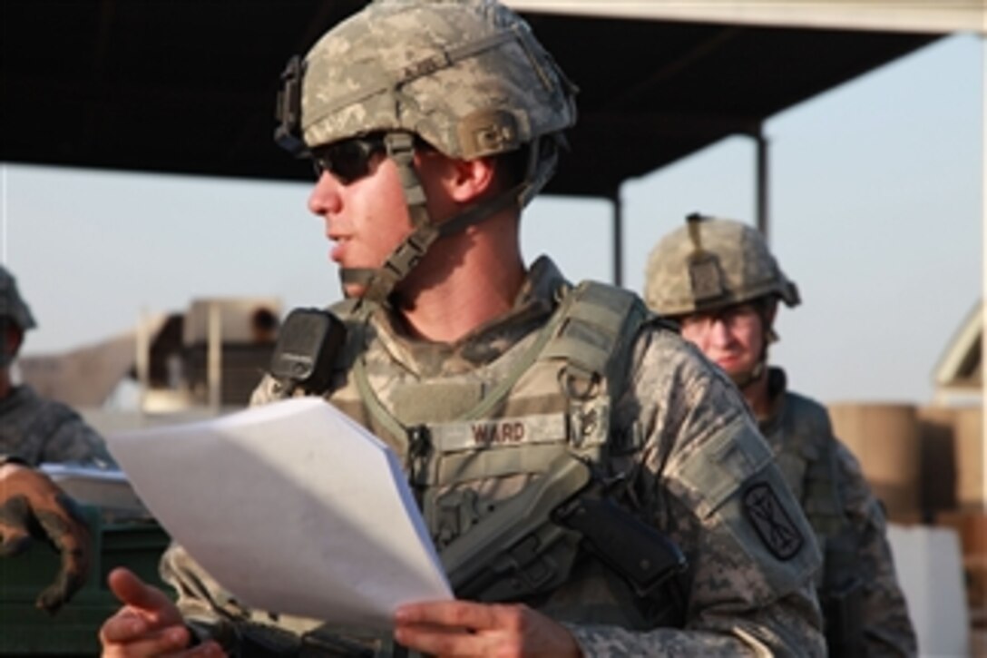 U.S. Army Staff Sgt. Samuel Ward, team leader and convoy commander, gives a pre-mission brief emphasizing safety and diligence to soldiers from the Guardians Maneuver Element, 17th Fires Brigade prior to departing Contingency Operating Base Basra, Iraq, on June 2, 2010.  