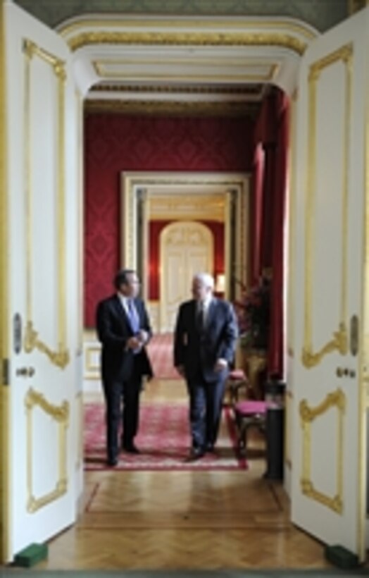Secretary of Defense Robert M. Gates walks with British Defense Secretary Liam Fox in the Lancaster House in London on June 8, 2010.  