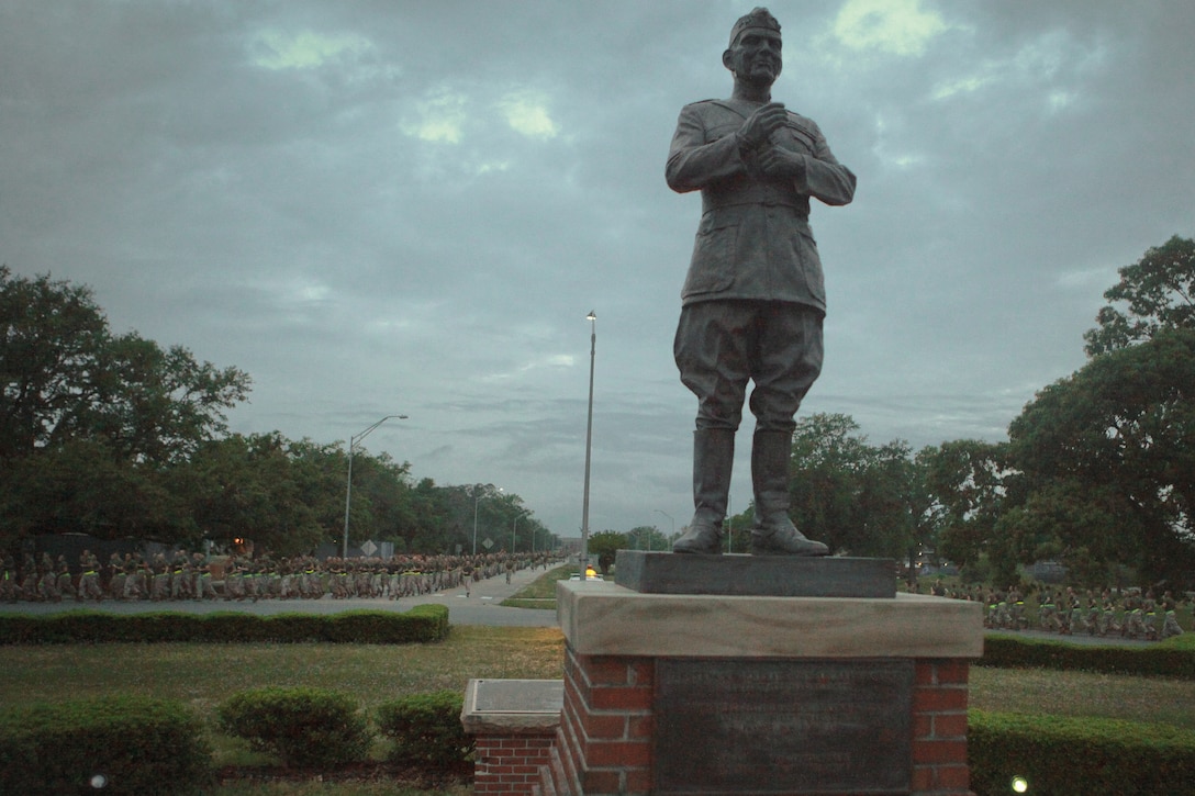Approximately 16,000 Marines of the 2nd Marine Division run around the General John A. Lejeune statue aboard Marine Corps Base Camp Lejeune, April 20. The Division run, led by Commanding General Maj. Gen. John A. Toolan, brought together every battalion under the Division for physical training, followed by words from Toolan and the Division Sergeant Major, Sgt. Maj. Michael F. Jones. (Official U.S. Marine Corps photo by Sgt. Bryan Peterson)