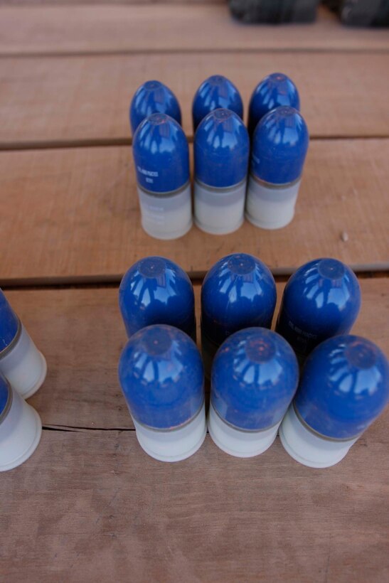 20100610M4150N671.JPG::r::::n::MARINE CORPS AIR GROUND COMBAT CENTER TWENTYNINE PALMS, Calif. – Grenade launcher rounds sit organized and ready for the Marines in Company D, 3rd Light Armored Reconnaissance Battalion to fire off during their running of Range 410 June 10. The Marines ran the range without ammo the day prior and used rounds June 10. (Photo by: Lance Cpl. M. C. Nerl)::r::::n::