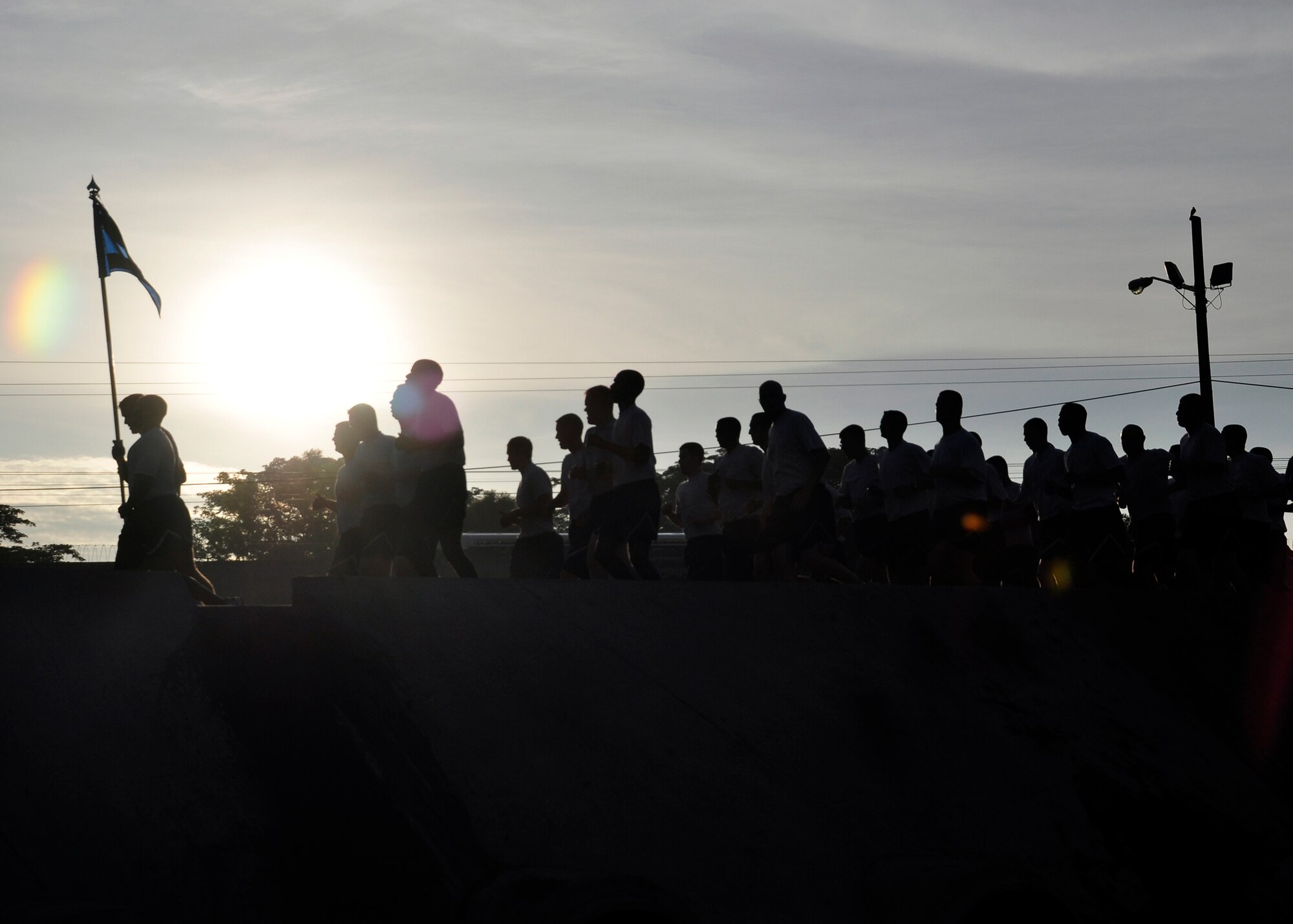 Joint Task Force-Bravo members started June 9 off with the monthly JTF-B run at Soto Cano Air Base, Honduras. All of Team Soto Cano is encouraged to participate in the formation run in order to build camaraderie, promote fitness and give commanders the opportunity to talk with servicemembers. (U.S. Air Force photo by Staff Sgt. Bryan Franks)