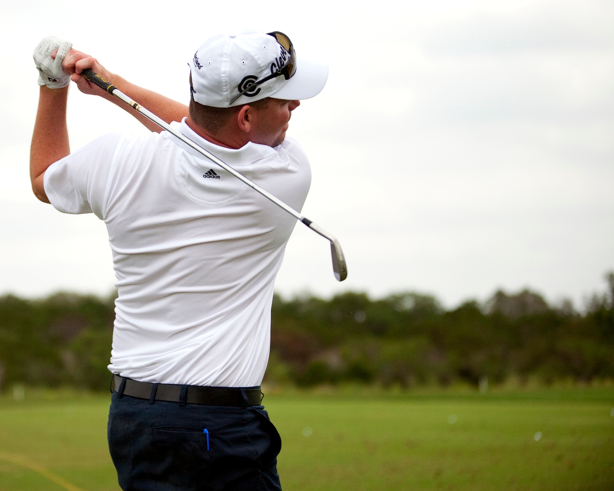 Senior Airman John Little II, from MacDill Air Force Base, Fla., practices his swing.  He was invited to play in the Valero Texas Open here May 13 - 16 which is the third oldest PGA Tour tournament. (U.S. Air Force photo)