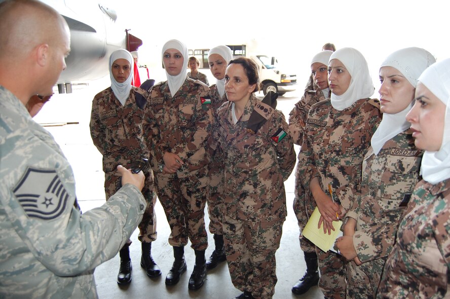 Master Sgt. John McCallick, 140th Wing Maintenance, discusses the engine system of the F-16 to Colonel Sana Fadel Ali Al-Sarhan and her troops from the Jordanian Armed Forces.  Females from both the Jordanian Army and Air Force visited the Colorado National Guard as part of an exchange under the State Partnership Program.

