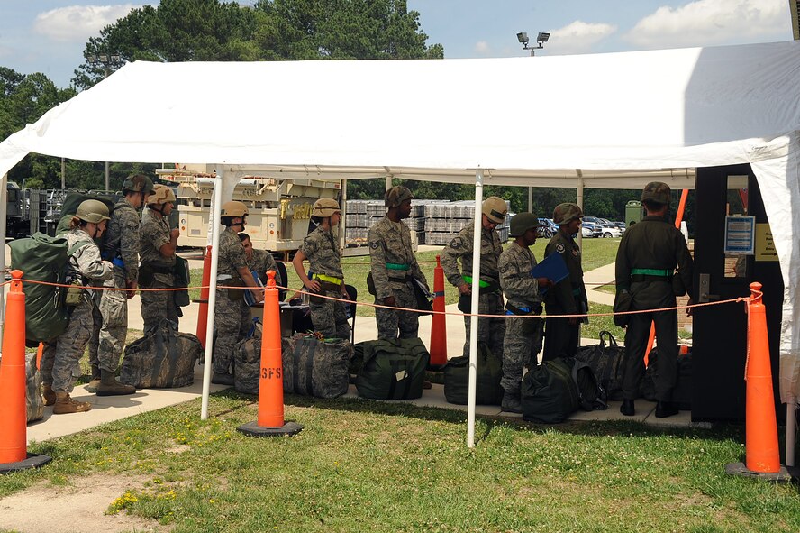 SEYMOUR JOHNSON AIR FORCE BASE, N.C. -- Airmen wait in the Personnel Deployment Function processing line during a Phase I Operational Readiness Exercise June 8, 2010. During the exercise, Airmen and units prepared items for deployment such as mobility bags, hazardous materials, classified items, weapons and ammunition based on deployment taskings which are not always part of a standard air expeditionary force deployment. (U.S. Air Force photo/Senior Airman Ciara Wymbs) 
