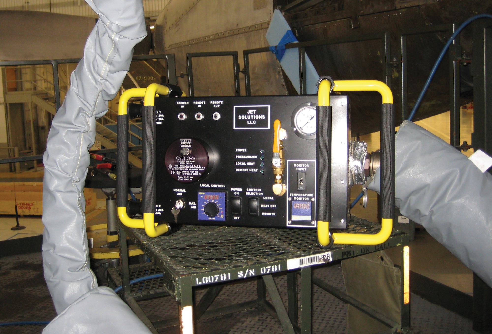 Materials engineers from AFRL's Air Force Advanced Composites Office developed this hot air module, or HAM.  Recently transitioned for warfighter use, the HAM enables depot crews to perform elevated-temperature bonded repairs and noncontact cures in field conditions. (AFRL image)
