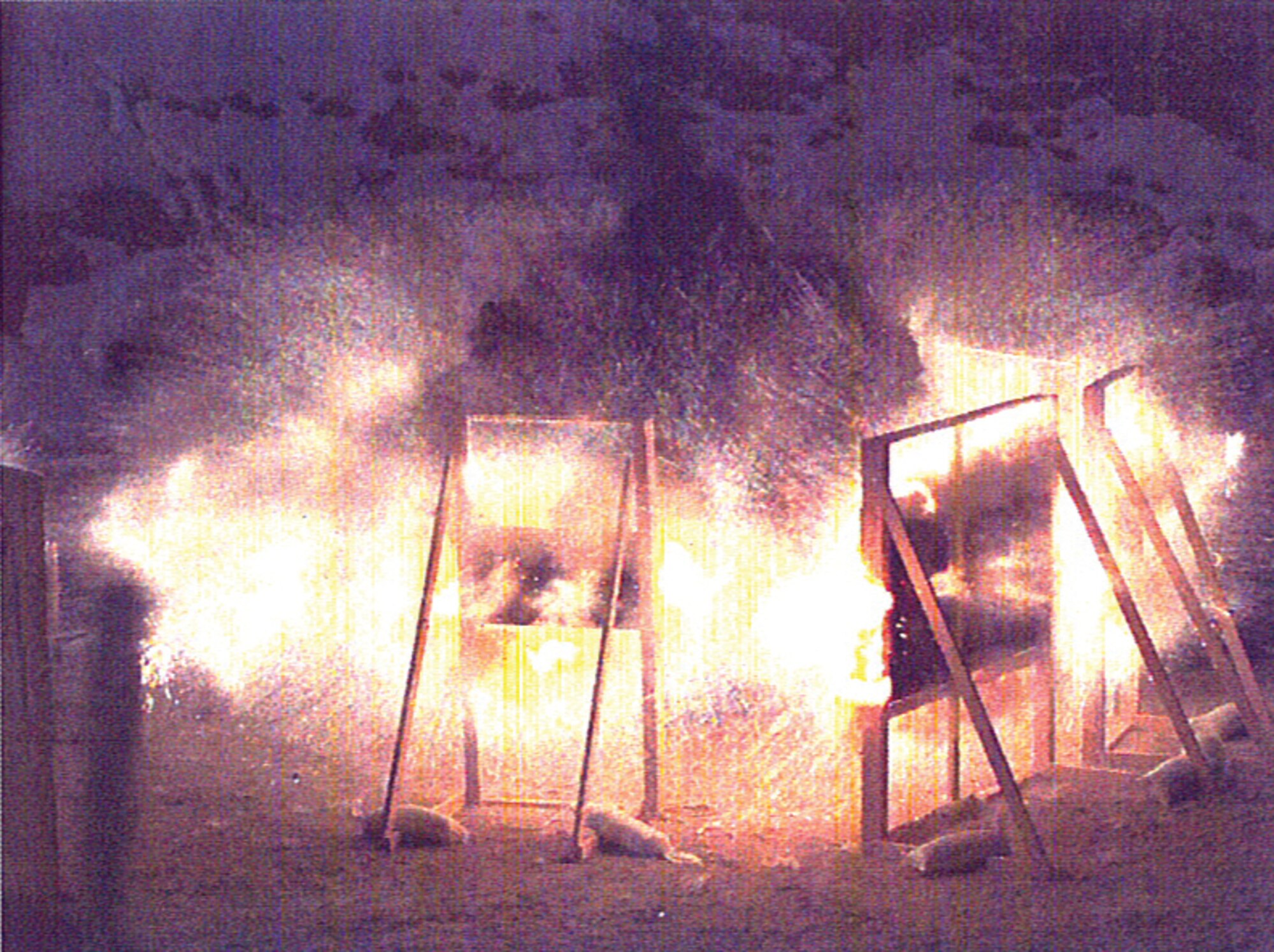 AFRL's Battle-Axe Ordnance warhead improves precision-guided submunitions defeat of diverse ground targets.  Pictured is a detonation sequence captured during recent tests of the munitions technology. (AFRL image)