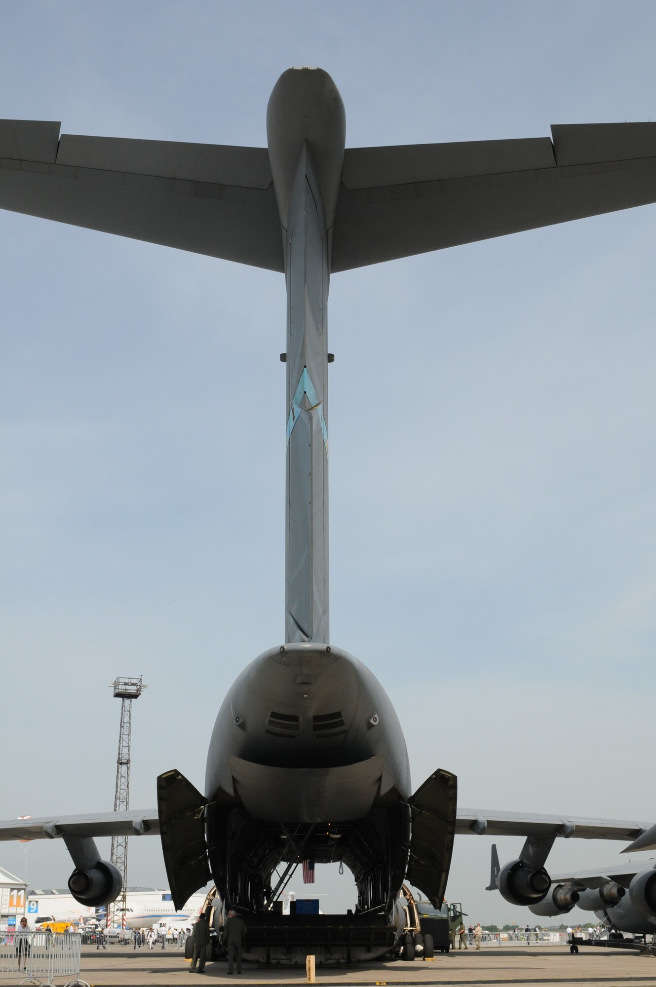 BERLIN -- Air crew prepare a C-5 Galaxy June 9 for the viewing public before the visitors come in for the ILA 2010 Berlin International Aerospace Exhibition and Conferences at the Berlin-Schoenefeld Airport. With the C-5 are 10 active-duty and Reserve aircrew that flew in from Dover Air Force Base, Del., to showcase one of the largest aircraft in the world and the Air Force’s largest airlifter in the service’s inventory. (U.S. Air Force photo/Staff Sgt. Julius Delos Reyes)