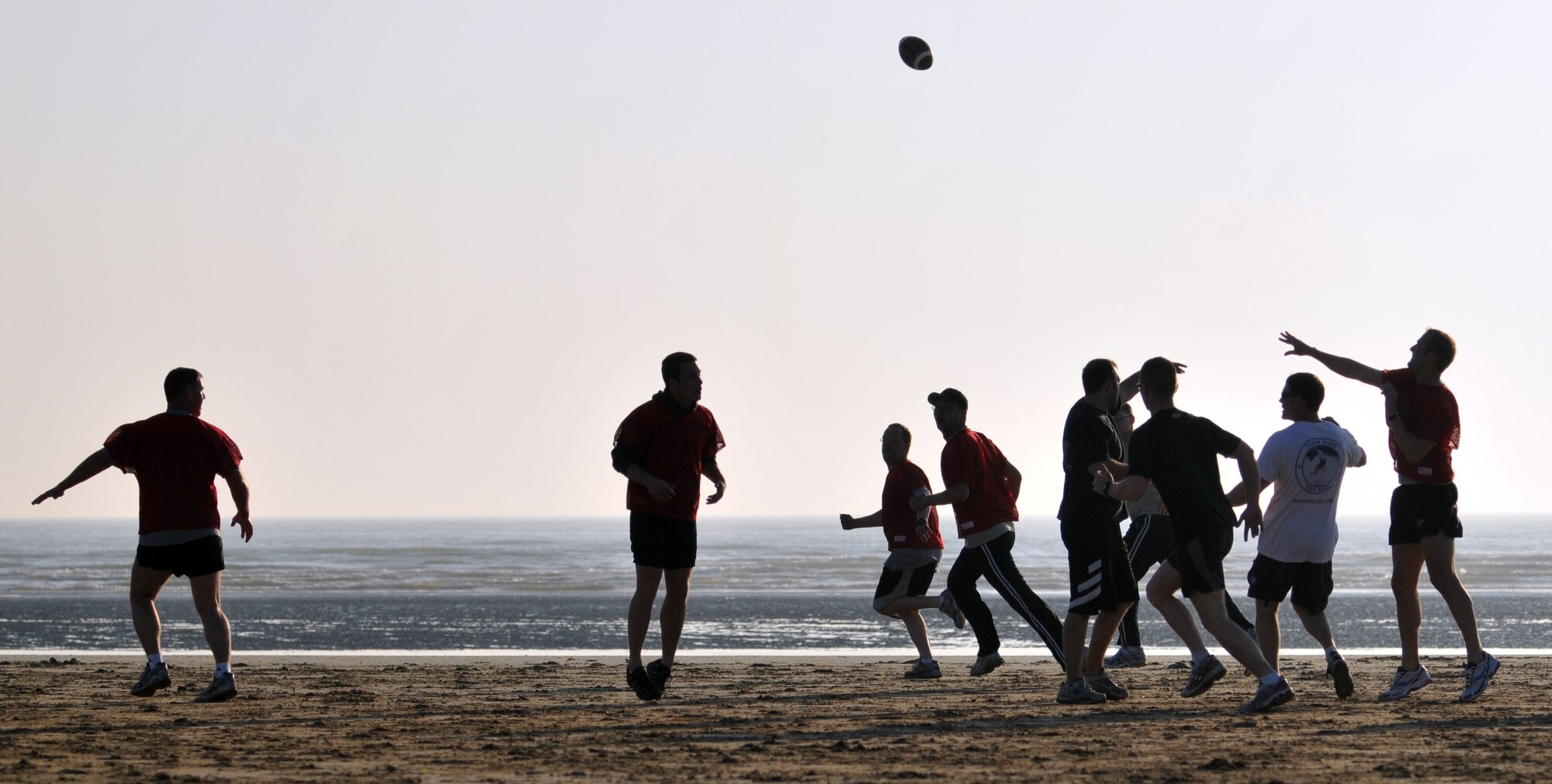 NORMANDY, France – Members of the 321st Special Tactics Squadron, RAF Mildenhall, England, play ultimate football on Utah Beach, one of the sites of the Allied landing in Europe in World War II, June 4.  The Airmen were in Normandy to participate in several ceremonies commemorating the 66th anniversary of the D-Day landings.  (U.S. Air Force photo/Staff Sgt. Austin M. May)