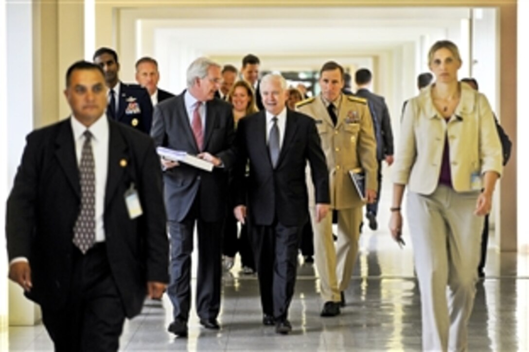 Ambassador Ivo H. Daalder, U.S. permanent representative to NATO, and U.S. Defense Secretary Robert M. Gates walk through NATO Headquarters during the NATO Defense Ministerial in Brussels, Belgium, June 9, 2010.