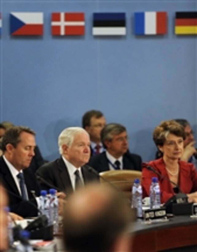 Secretary of Defense Robert M. Gates listens to the opening remarks of the North Atlantic Treaty Organization Defense Ministerial at NATO Headquarters in Brussels, Belgium, on June 9, 2010.  