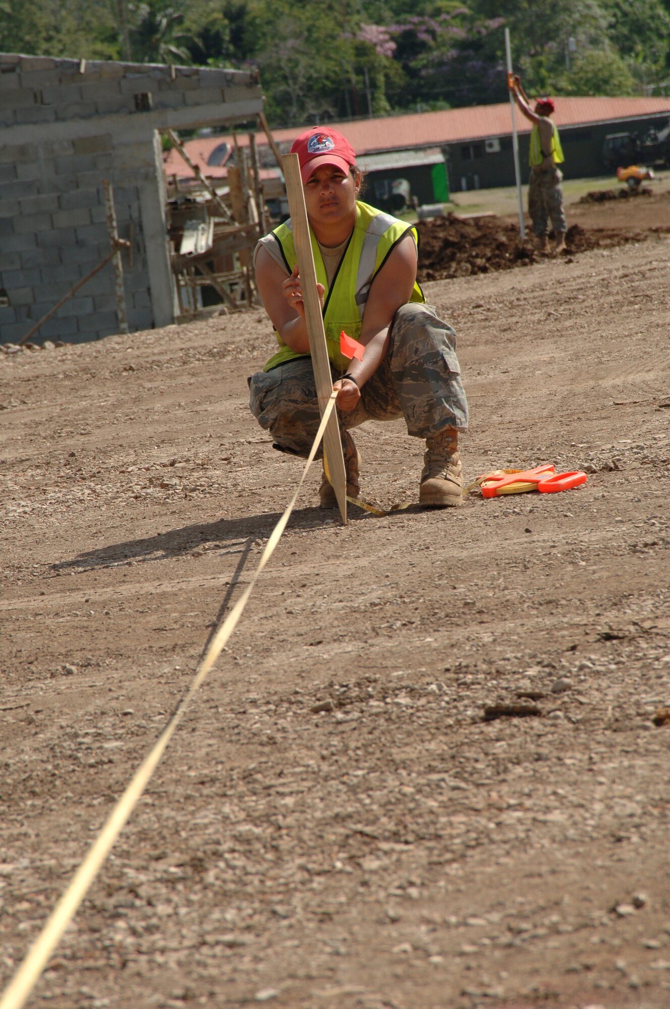 Master Sgt. Sol Rios-Montalvo, 567th RED HORSE Squadron engineering assistant, stakes out tent locations at the temporary encampment that will house more than 250 Airmen, Soldiers, and Marines for New Horizons Panama 2010. (U.S. Air Force photo/Tech. Sgt. Eric Petosky)